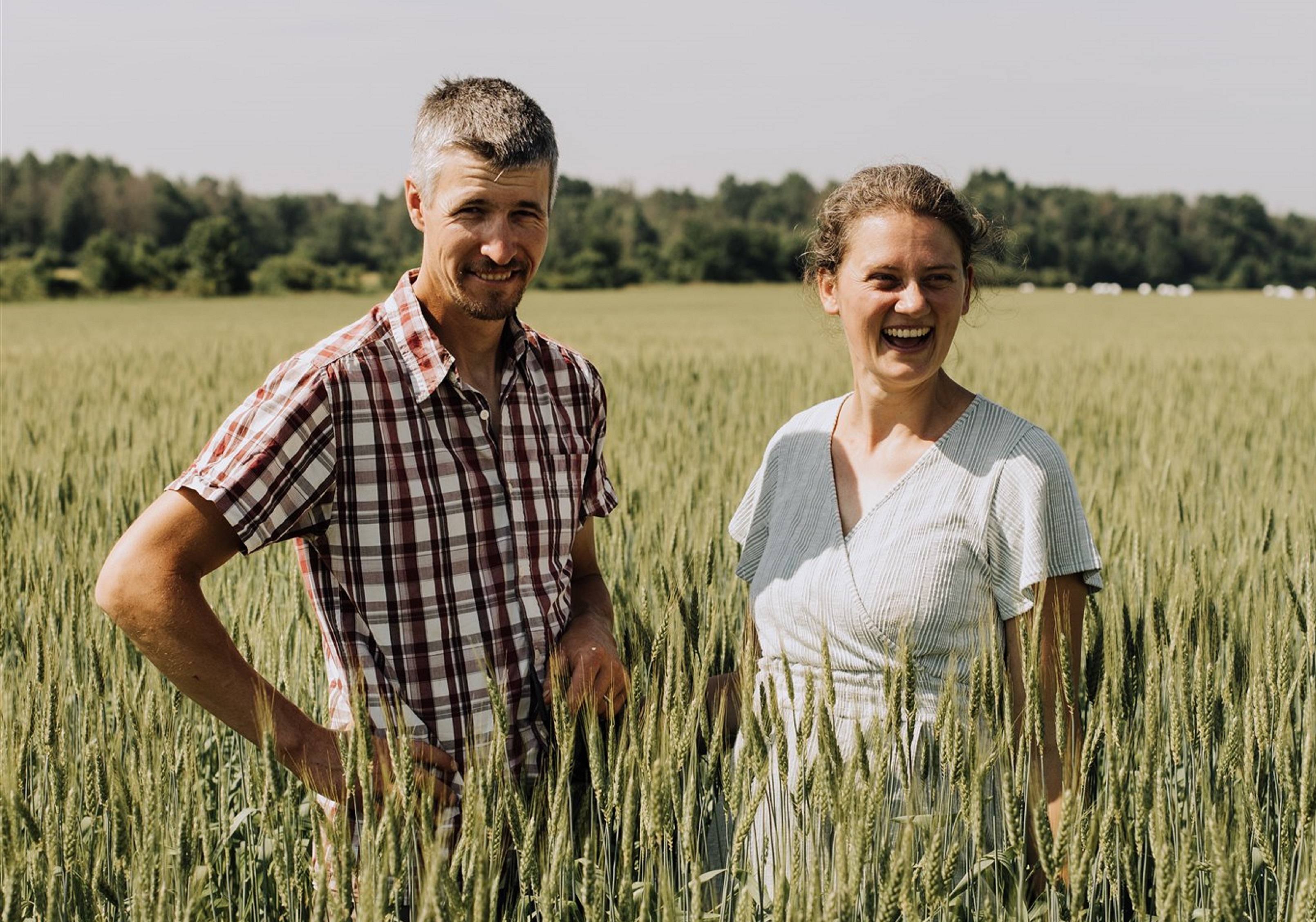 A picture of Erik and Edda Boettcher standing in a field.