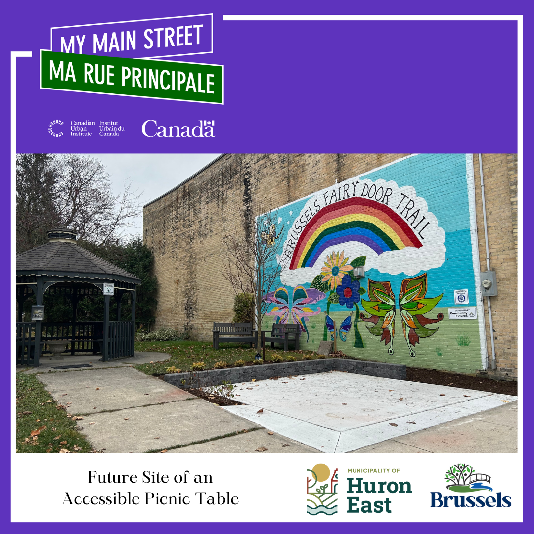 A picture of the new concrete pad in the Brussels Downtown Parkette with the My Main Street Logo at the top of the photo.